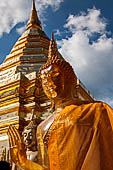 Chiang Mai - Wat Phra That Doi Suthep. The innercourtyard of the temple is filled with Buddha statues and other religious paraphenalia. 